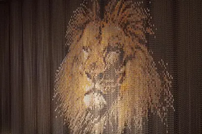 a close up of a cat on a curtain at Landgasthof Lowen in Sulgen