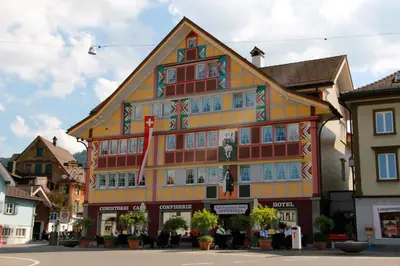 a building in the middle of a street at Hotel Appenzell in Appenzell