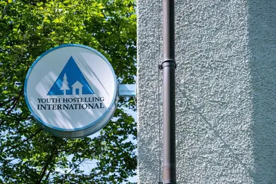 a sign on the side of a building at St. Gallen Youth Hostel in St. Gallen