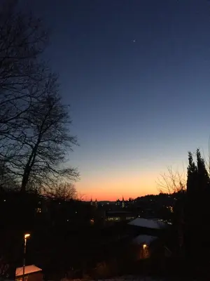 a view of a sunset with the sky at St. Gallen Youth Hostel in St. Gallen