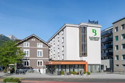 a hotel with a sign on the front of it at Hotel Buchserhof in Buchs