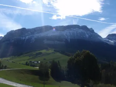a mountain in the distance with a road at Ferienwohnung Brülisauer in Brülisau