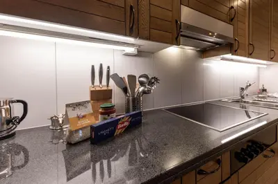 a kitchen with a sink and a counter top at Schwalbennest in Wildhaus