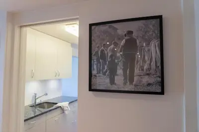 a picture of a group of people on a wall at Lisighaus in Wildhaus