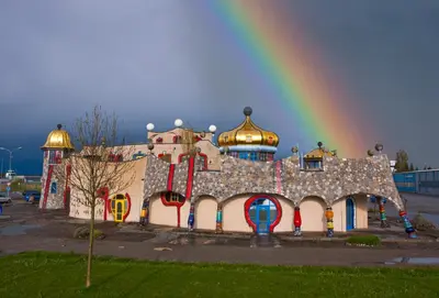 a rainbow over a building with a rainbow at Studio direkt am Bodensee in Thal