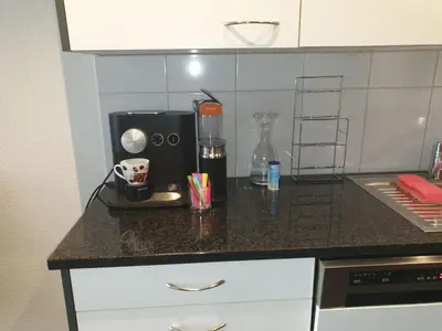 a kitchen counter with a blender on top of it at 3 Doppel Zimmer Apartement in 9320 Arbon in Arbon