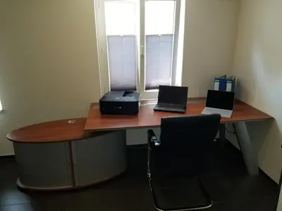 a desk with two laptops and a printer on it at 3 Doppelbett Business Apartment am Bodensee in Arbon