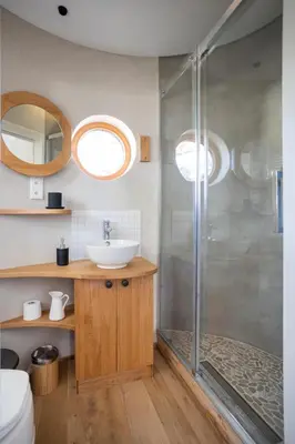 a bathroom with a sink and a shower at Logis Freyja in Landschlacht Gemeinde Münsterlingen