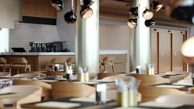 a restaurant dining room with tables and chairs at Hotel Walhalla in St. Gallen