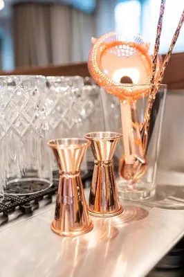 a group of glass vases sitting on a table at Hotel Heiden - Wellness am Bodensee in Heiden