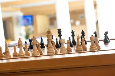a close up of chess pieces on a chessboard at Hotel Sternen Unterwasser in Unterwasser