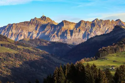 a view of a mountain range with trees at Hotel Sternen Unterwasser in Unterwasser
