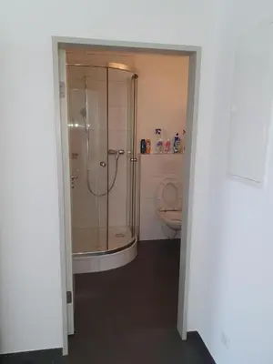 a bathroom with a shower and a toilet at Schönes Studio in Arbon am Bodensee Neu Klimatisiert ! in Arbon
