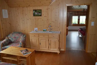 a living room with a couch and a table at BnB-Blomberg in Ebnat