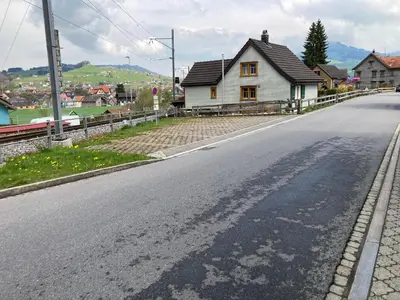 an empty road in front of a house at BNB Claudia in Appenzell