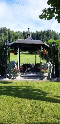 a gazebo with two polar bears in a park at Loft in der Natur mit Gartenzugang und Sauna in Herisau
