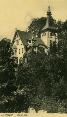 an old photo of a white house on a hill at Villa Bergruh in St. Gallen