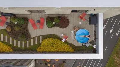 an overhead view of a park with a playground at Tailormade Hotel LEO St Gallen in St. Gallen